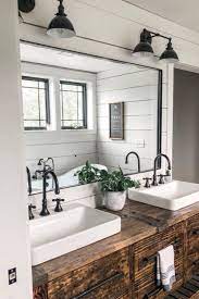 They could range from something with an industrial flare to something with a more polished glass shade. Bathroom Lighting Ideas Rustic Bathroom Vanities Farmhouse Bathroom Decor Bathroom Farmhouse Style