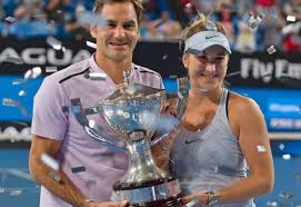 Roger federer and belinda bencic pose with the hopman cup trophy after defeating alexander zverev and angelique kerber of germany in the final during the 2018 hopman cup at perth arena on january 6, 2018 in perth, australia. Federer Lauds Hingis After Hopman Win Saudi Gazette