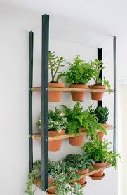 An Ikea Hyllis Shelf Turned Into A Suspended Industrial Garden That Saves Your Floor Space Industrial Wall Planters Ikea Planters Wall Planter