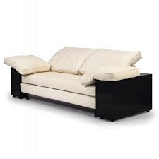 Seitenboxen aus mdf farbig hochglanzlackiert mit kunststoffrollen in schwarz. Sofa Lota Von Classicon