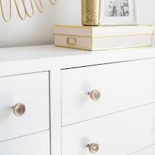 Keep a hotel or apartment looking nice while allowing the resident to store clothes and get dressed. Agate Nursery Dresser Knobs Design Ideas