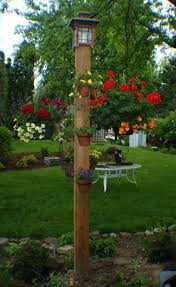 Pin By Kathy Morstad On Landscaping Outdoor Plant Hanger Diy Garden Garden Art