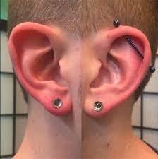 Healed Industrial With A Blue Anodized Titanium Barbell As Well A Some Fresh Stretched 4g Lobes By Mollymoonpierce Body Piercings Stretched Ears Body Jewelry