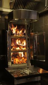 Vertical Rotisserie Wood Fired Google Search Bbq Restaurant Shawarma Fire Cooking