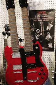 Binoculars with compass and pouch; Check Out These Adorably Hardcore Knitted Guitars Make