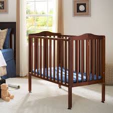 Delta Children Folding Portable Mini Crib With 1 5 Inch Mattress Cherry Walmart Com Portable Baby Cribs Portable Crib Cribs