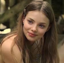 Where to place a 6.5 ft eucalyptus tree in a living room with 20 ft  ceilings?