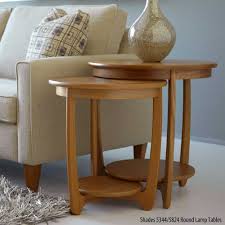 Wooden coffee tables are a time honored classic, and these rustic coffee tables are no different. Nathan Classic Teak Glass Top Round Coffee Table The Rink Harrogate