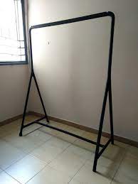 There are casters on one end (so you can wheel it around), but it has perfect for people who have too much clothes and not enough closet space. Turbo Ikea Rack Off 52