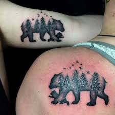 Two of these tattoos use a forest as a backdrop and utilize a variation in black and gray tones to create depth in the piece that is both technically impressive and visually charming. 101 Cool Father Son Tattoos Ideas And Quotes 2020
