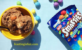 Vanilla ice cream with smarties (19%) (milk chocolate in a crisp sugar shell) without artificial colours and flavourings. Smarties Chocolate Mini Egg Ice Cream Feasting Is Fun