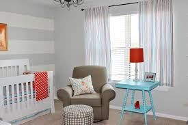Gliders make a back and forth motion that requires less effort than the traditional rocking chairs. Aqua Orange And Grey Nursery Project Nursery