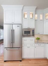 Crown molding is cut at an angle at the ceiling and wall/cabinet. 8 Crown Molding In Kitchen Ideas Kitchen Redo New Kitchen Kitchen Remodel