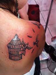 Birds Flying Out Of Cage Tattoo On Back Shoulder For Women Entertainmentmesh