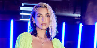 Blonde to brown hair transformation. Dua Lipa S Dark Brown Hair Is Back By Popular Demand See The Photos Allure