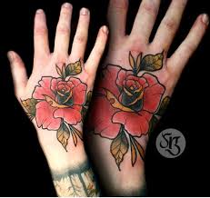 Rose flowers are magical and visually captivating given the adorable colors that they come with. Top 101 Best Rose Hand Tattoo Ideas 2021 Inspiration Guide