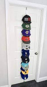 The Clip Hanger Hat Rack Holds 20 Hats On 1 Strap Any Size Any Style Any Shape Wall Door White Clothes Hanger Rack Closet Wall Organizer Office Wall Organiser