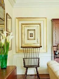 Using empty picture frames to create a gallery style wall will create interest where there is none in your home in achic on a shoestring way. How To Fill An Empty Frame Decor Frame Within A Frame Displaying Family Pictures