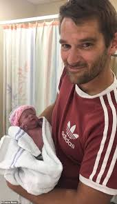 Toddler with dwarfism takes her first steps thanks to her doting dog who's  been her pal since birth