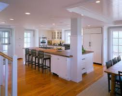 In this open floor plan kitchen, the tables can be easily moved depending on the flow of traffic and the number of people dining. Open Concept Kitchen Island With Support Columns Novocom Top