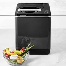 An electric composter is an indoor compost bin alternative which uses aeration, heat and pulverization to reduce food waste volume, emissions and odor. Vitamix Foodcycler Electric Kitchen Composter Williams Sonoma