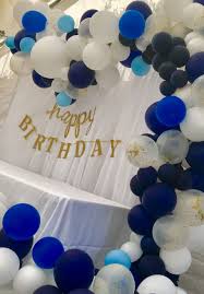 Balloon Decoration Ideas For Birthday Party At Home For Husband Balloon Garland With Hints Of Blue Male Birthday Party Ideas Blue White And Gold Party Birthday Balloon Decorations Mens Birthday Party Birthday Balloons
