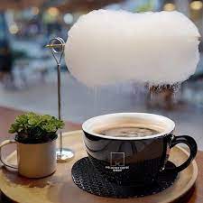 A Fluffy Cotton Candy Cloud Drips A Sweet Little Rain Of Sugar Into A Hot Cup Of Coffee From Overhead Cotton Candy Clouds Rain And Coffee Cotton Candy