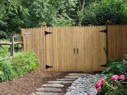 6 Foot Wood Privacy Fence Stockade Style With Double Gates Fence Landscaping Natural Fence Backyard Fences
