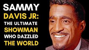 Sammy Davis Jr. was a Black performer who broke racial barriers in  Hollywood. As a child, Davis performed vaudeville with his father until he  was drafted into the Army to fight in
