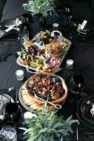 You can make the simple syrup and chill the champagne and gelatin mixture in advance, so you'll have time for other party prep work. Chic Black Halloween Dinner Party Table Setting Ideas With Photos Halloween Party Dinner Halloween Dinner Halloween Dinner Party Food