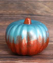First, paint your pumpkin black and let it dry completely. 30 Painted Pumpkins And Other No Carve Pumpkin Decorating Ideas