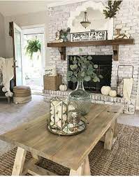 Flowers In Vase Wrought Iron Baskets Farm House Living Room Living Room With Fireplace Farmhouse Decor Living Room