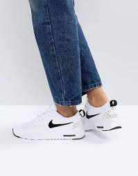 Discover women's nike trainers featuring styles for running and sports offering ultimate comfort and style. Nike Air Max Thea Trainers In White And Black Asos
