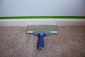 How to mask carpet with painters tape to prep baseboards to be hand brushed or sprayed with an. How To Paint Floor Trim Bower Power Painting Trim Painting Baseboards Painted Floors