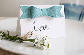 Give the kids something to shoot at that doesn't involve a video screen. Diy Glitter Bow Place Cards Pretty Prudent