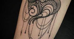 The highly appreciable positions to get this lace tattoo inked are thighs, shoulders, back, lower back, sleeves and back of the neck. Lace Heart Tattoo With Tassel Chain Effect So Delicate And Tattoos At Repinned Net