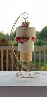Maybe you would like to learn more about one of these? Upside Down Hanging Chandelier Cake Statement Wedding Cake Gold Leaf Flowers And Sequins Chandelier Cake Hanging Cake Wedding Cake Stands