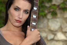 Beautiful Brunette With Bass Photo Background And Picture For Free Download 