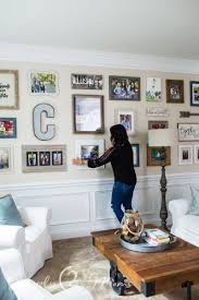How To Create A Large Farmhouse Gallery Wall Simply2moms Gallery Wall Living Room Farmhouse Gallery Wall Family Gallery Wall