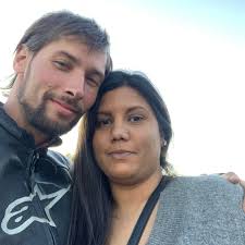 Does anyone have a car booster pack and can boost my car ? I have booster  cables but I'm parked so far up no one can get around to boost me through