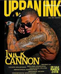 His face is turned away but he bears the star's distinctive tattoos—who is shown with both hands. Pin On I Nick Cannon