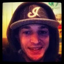 New Indians Hat, but it's a cursive J to me.