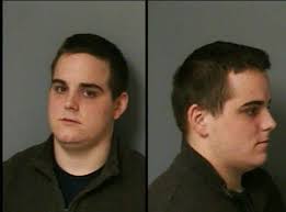 Police Charge Coin Theft Suspect with Larceny