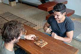 Pop out the reinforced support legs for a free standing table or place flat on a table of your own. Bsiri Tictactoe Wooden Board Games Noughts And Crosses Family Brain Teaser Puzzle Coffee Table Buy Online At Best Price In Uae Amazon Ae