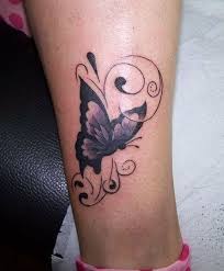 Sunflower with a butterfly tattoo on the forearm; 67 Butterfly Tattoos On Ankle