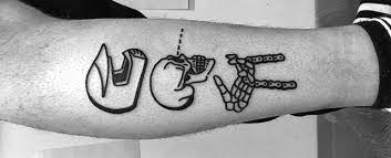 Simple black flower tattoo on the inner arm. 40 Simple Skull Tattoos For Men Bone Ink Design Ideas