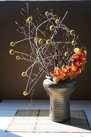 Armature Of Craspedia And Manzanita Ikebana Flower Arrangement Ikebana Arrangements Modern Flower Arrangements