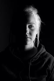 This Is An Example Of A Side Light Image The Use Of Side Lighting Only Illuminates Half Of Her One Light Portrait Light Photography Split Lighting Photography
