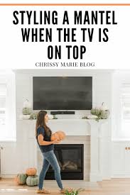 This method works especially well above fireplaces because it shields. Mantel Decor With A Tv How To Pull It Off Chrissy Marie Blog