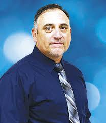 Cantu cashes in: Football coach paid double for work?